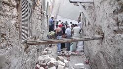 Search for people feared trapped in rubble after building collapse News Clip