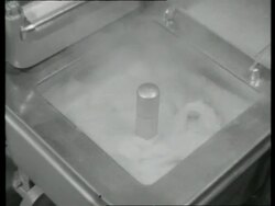 Electric washing machine.  Mangle, UK  1939 Stock Footage