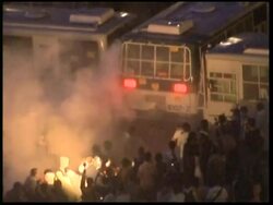 WRAP Police use tear gas as protesters keep up pressure on gov't over US beef imports News Clip