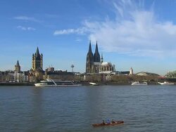 WS View of Rhine river with church Gross St. Martin and Dom (Cathedral) / Cologne, North Rhine Westphalia, Germany Stock Footage