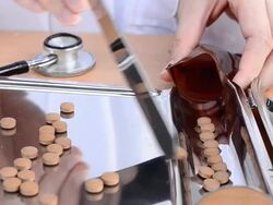 Counting tablets medicine Stock Footage
