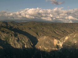 "Large valley and mountain range spreading off into distance, blue cloudy sky, Amazonas region of Peru [PerÃƒÂº]" Stock Footage