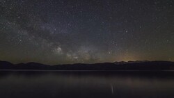 T/L Milky way rising at the west shore of lake Walchensee Stock Footage