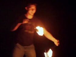 Caucasian man dancing with fire Stock Footage