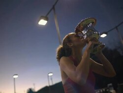 CU, LA, Young female tennis player holding trophy, dusk, Santa Barbara, California, USA Stock Footage