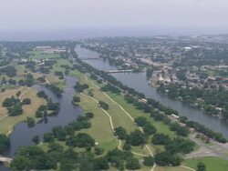 WS AERIAL View of River between city / Louisiana, United States Stock Footage