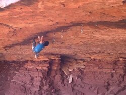 WS ZO View of male climber climbing crack upside down / Moab, Utah, United States Stock Footage