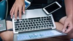 Man using laptop and smartphone. Stock Footage
