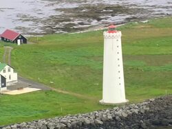 MS AERIAL Shot of lighthouse / Iceland Stock Footage