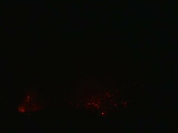 Lava erupts from volcano crater at night, Stromboli, Italy. March 2010 Stock Footage