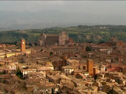 Aerial old buildings and Gothic cathedral / Orvieto, Italy Stock Footage
