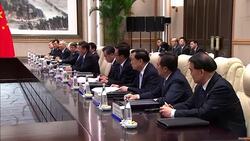 UK Prime Minister Theresa May and Presidetn Xi Jinping - G20 Summit News Clip