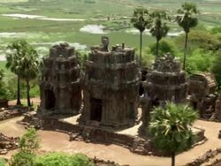 Scenic aerial shots of Cambodian landscape, rice fields, temples, jungle,  and irrigation systems Stock Footage