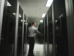 man giving a tour of a server room Stock Footage