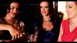 Three women champagne being poured Stock Footage
