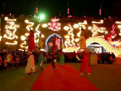 MS PAN Artists carry children dressed as ancient figures during shehuo performing at city wall new year lantern festival, Shehuo is traditional festive folk celebration during chinese spring festival AUDIO / xi'an, shaanxi, china Stock Footage