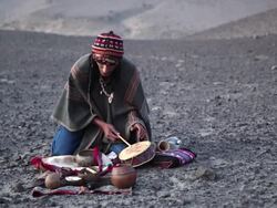 MS Shot of man doing Native ritual AUDIO / South Of Peru, Nazca, Peru Stock Footage