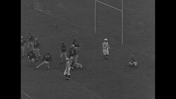 Midshipmen start out in the lead during 1944 Navy-Notre Dame football contest in Baltimore, MD News Clip