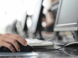 people use computer to search books in library Stock Footage