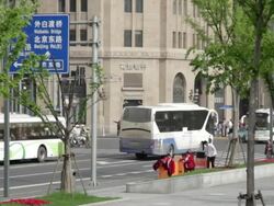 MS Shot of buses and cars moving on streets / Shanghai, China Stock Footage