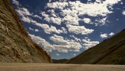 Clouds Time Lapse and Mountain Pass Stock Footage