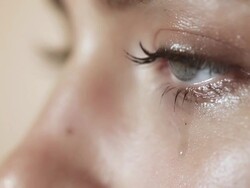Woman crying closeup Stock Footage