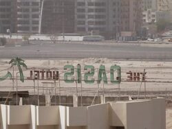 MS View of the back of sign on roof with Cars moving on road / Doha, Qatar  Stock Footage