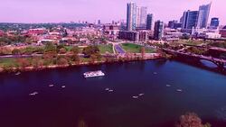 Old Hipster new School Effect Filer Aerial View Austin Texas Skyline Colorado River Fun Spring water activities with Party Boat SXSW 2016 Perfect Angle Stock Footage
