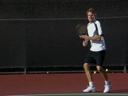SLO MO, WS, Young man playing tennis, Santa Barbara, California, USA Stock Footage