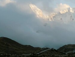 WS T/L Clouds swirl over valley in front of Ama Dablam mountain range / Pheriche, Solu Khumbu, Nepal Stock Footage