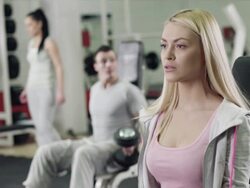 Woman Working With Weights In Gym Stock Footage