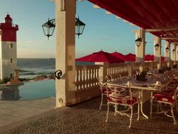 MS Shot of Ocean Terrace Restaurant and swimming pool at The Oyster Box in Umhlanga / Umhlanga, Kwazulu Natal, South Africa Stock Footage