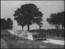 1954 Nash line of cars on road and test track Stock Footage