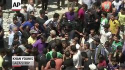 Palestinians in Gaza held a funeral for eight members of a family, killed in an Israeli airstrike early Thursday. Israel says it's doing all it can to avoid civilian casualties. (July 11) Instructional Video