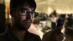 Using smartphone, office worker. Stock Footage