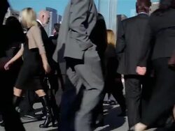 Medium shot crowd of businesspeople walking back and forth Stock Footage