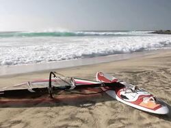 MS View of Wind sail Surf boat at beach near Santa Maria / Santa Maria, Sal, Cape Verde Stock Footage
