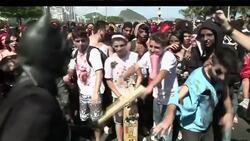 Zombies walk the streets to celebrate Day of the Dead News Clip