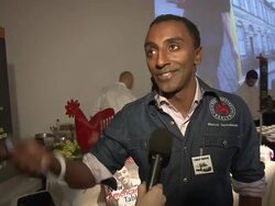 INTERVIEW: Marcus Samuelsson of Red Rooster Harlem on where he orders take out food at the New York Taste A World Of Flavors Presented By HSBC Premier at New York NY Stock Footage