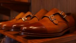 the shoemaker repairs a shoe Stock Footage