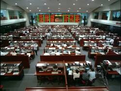WA trading room of the Philippine stock exchange, information display board, people working, Philippine stock exchange, Makati, Manila, Philippines Stock Footage