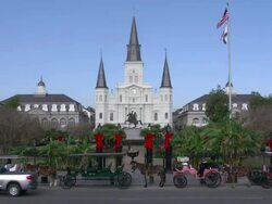 Jackson Square and carriages from Decatur Street in New Orleans Stock Footage