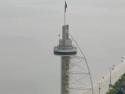 WS AERIAL DS ZO View over Parque das Nacoes since Vasco da Gama Tower to "Pavilhao Atlantico" from Tagus River / Lisbon, Portugal   Stock Footage