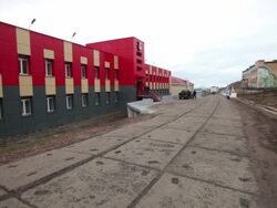 The headquarter of Arktikugol, the Russian mining company, owing the mines in Barentsburg and the whole Svalbard archipelago Stock Footage