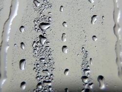 water drops on metal surface Stock Footage