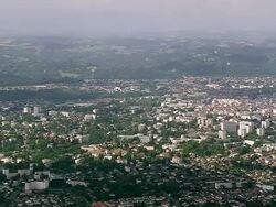WS AERIAL View of city with wooded area (Viellesegure) / Aquitaine, France Stock Footage