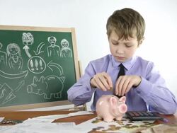 boy businessman and piggy bank Stock Footage