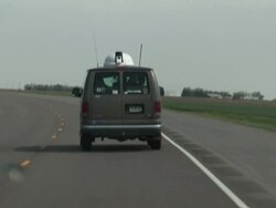 Chase van vehicle on open road, driving, prairie, MS, USA Stock Footage