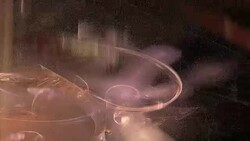 Colored smoke swirls against a black background. Stock Footage