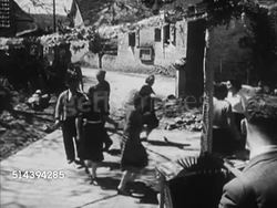 1950: DORDOGNE VALLEY: EXT VS French country people performing Dordogne Valley dance, male playing accordion BG, toddlers watching, couples in group dancing. Aquitaine Region, France, countryside, rural Instructional Video